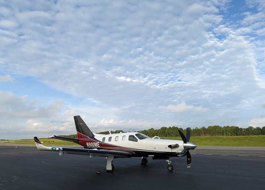 Little Hawk Logistics TBM 900 N900ME on the ramp at Charlottesville