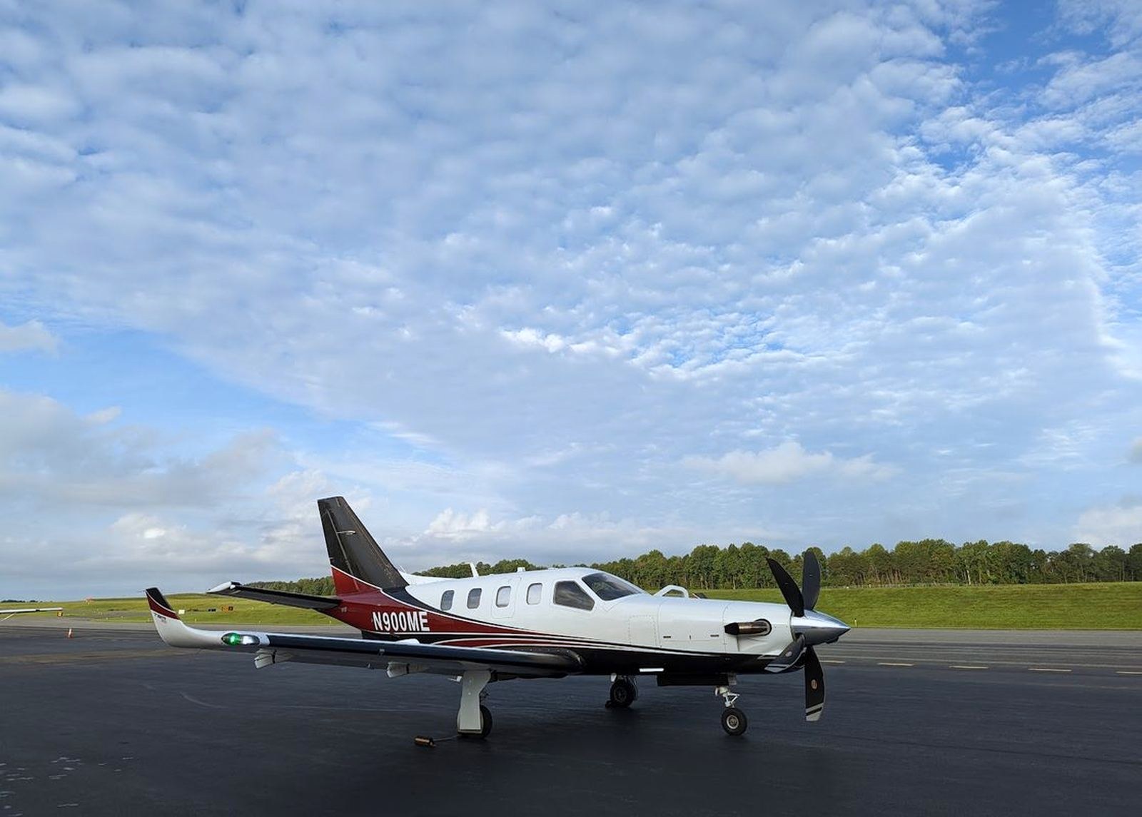 Little Hawk Logistics TBM 900 N900ME on the ramp at Charlottesville