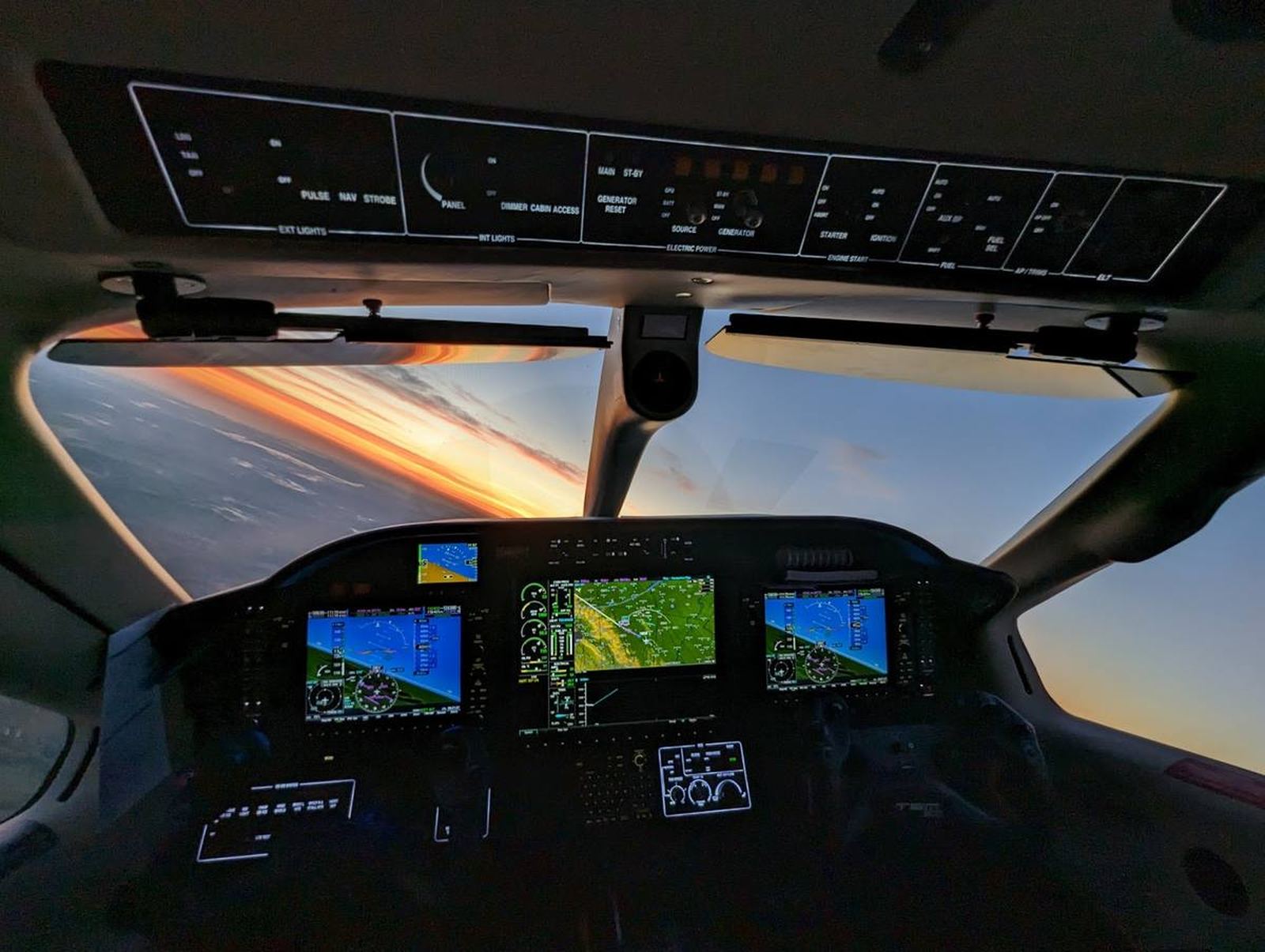 TBM 900 cockpit at sunset