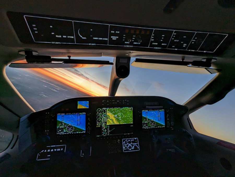 TBM 900 cockpit at sunset