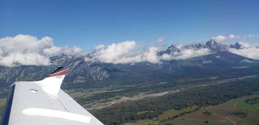 TBM 900 wing over the Grand Tetons